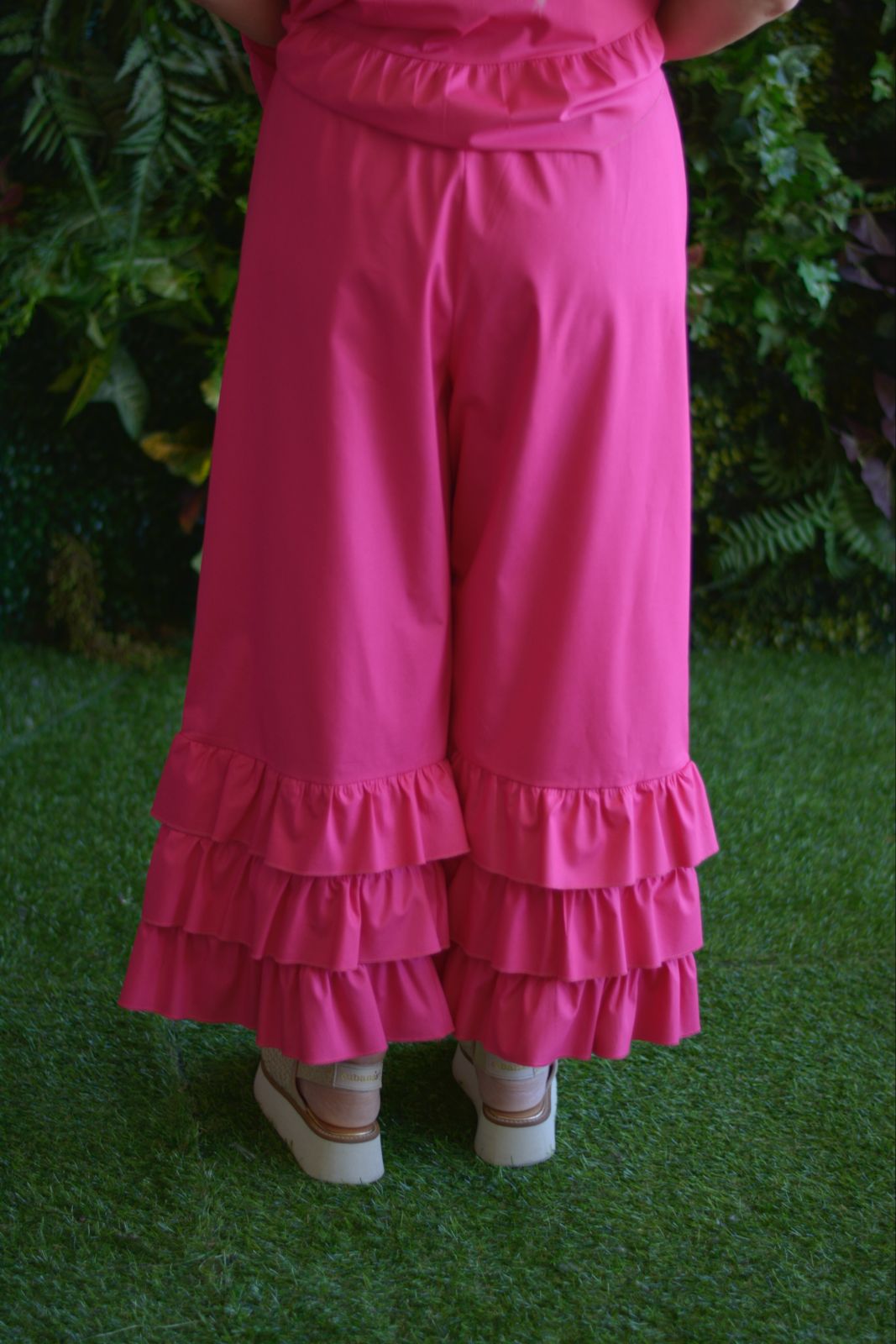 Pantalonas folhos fuschia